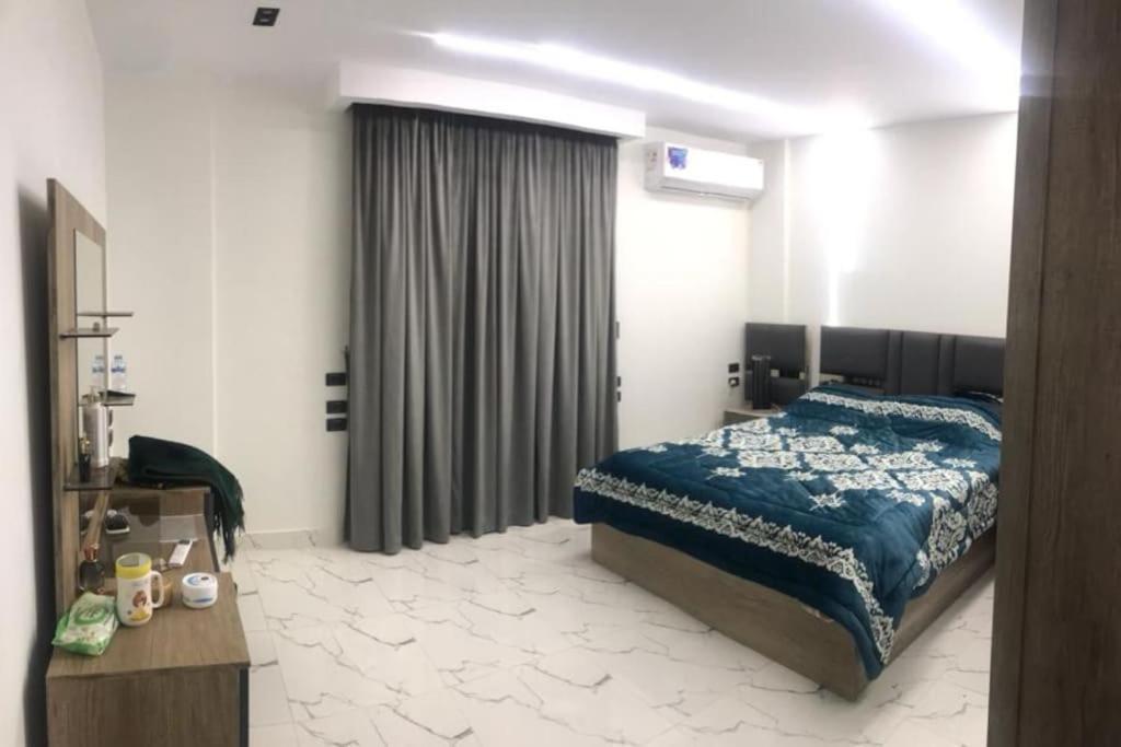 بغرفتين قرب مول مصر وميدان جهينة Families Only *
